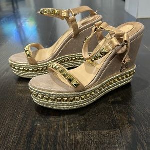 Woman’s wedges red bottoms “fake”